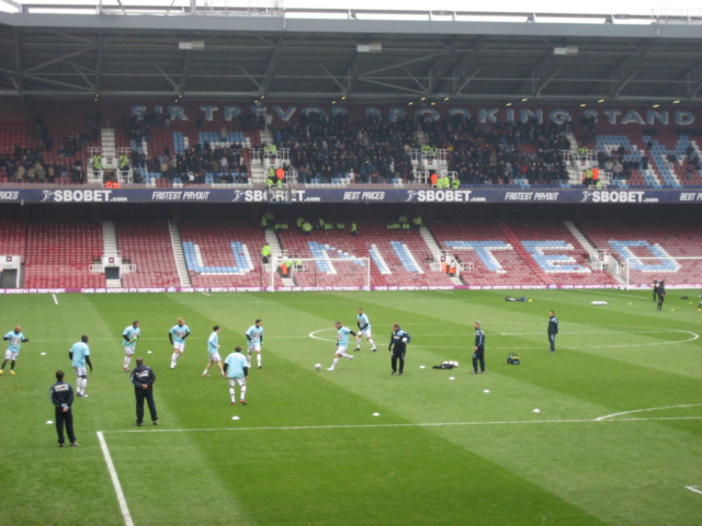 MIllwall warming up in front of their supporters